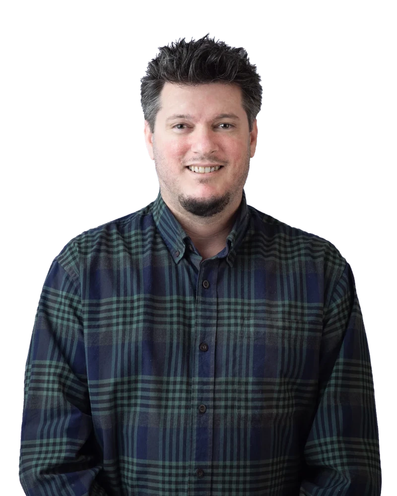 Brad Weldy, the OC Marketing Guy, smiling in a plaid shirt
